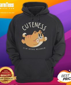 Funny Cat Cuteness Is My Defense Mechanism Hoodie featuring a playful cat graphic and cozy design for casual wear.