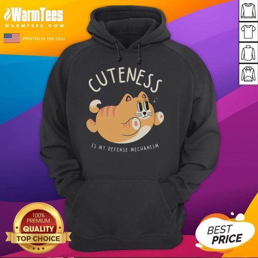 Funny Cat Cuteness Is My Defense Mechanism Hoodie featuring a playful cat graphic and cozy design for casual wear.