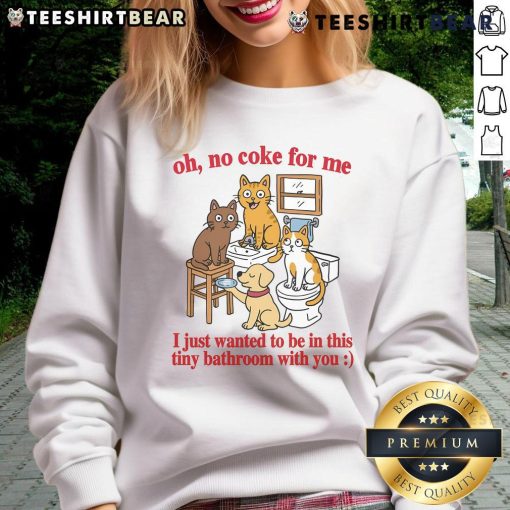 Alt Text: Funny cats in a tiny bathroom wearing a sweatshirt that says 'Oh No Coke for Me' showcasing adorable feline antics.
