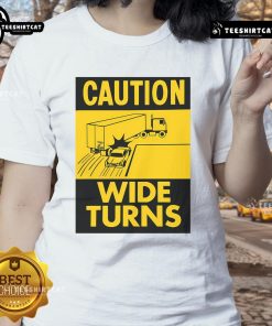 Funny caution wide turns graphic on a ladies tee, perfect for trucker safety enthusiasts and casual wear.