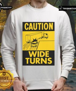 Funny caution sweatshirt for truckers featuring 'Wide Turns' warning, perfect for safety and humor on the road.