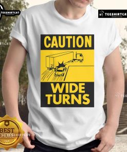 Alt Text: Funny Caution Wide Turns Trucker Safety T-Shirt featuring a humorous design for truckers promoting road safety.