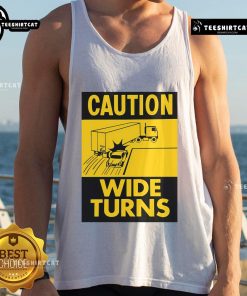 Funny caution wide turns trucker safety tank top featuring a humorous graphic for truck drivers and road safety awareness.