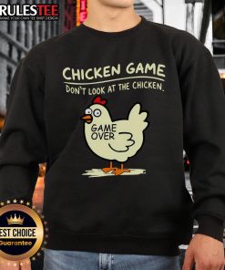 Funny chicken game sweatshirt featuring 'Don't Look at Chicken Game Over' design, perfect for gamers and chicken lovers.