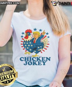 Funny chicken jockey Trump trending ladies tee featuring a humorous design of a chicken riding a mini Trump.