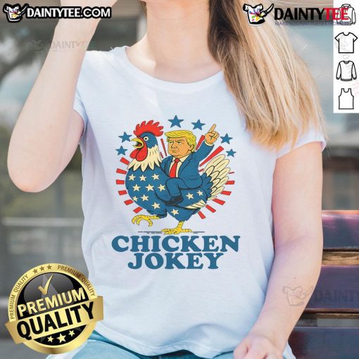 Funny chicken jockey Trump trending ladies tee featuring a humorous design of a chicken riding a mini Trump.