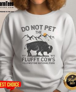Funny 'Do Not Pet The Fluffy Cows' sweatshirt from Yellowstone National Park, est. 1872, showcasing playful cow graphics.