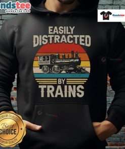 Funny hoodie for train lovers featuring a distracted by trains graphic against a sunset background.