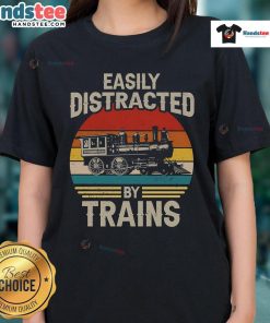 Funny train lover tee featuring a distracted by trains design against a sunset backdrop, perfect for railroad enthusiasts.