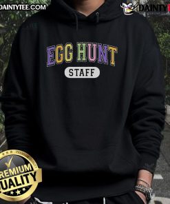 Funny Egg Hunt staff wearing varsity hoodies at an Easter event, showcasing team spirit and festive fun.