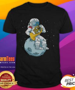 Funny French horn astronaut graphic on a brass music T-shirt, perfect for musicians and space enthusiasts.