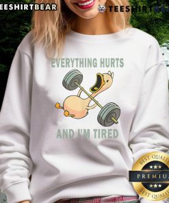 Funny gym duck quote on a sweatshirt: Everything Hurts And I'm Tired perfect for workout enthusiasts and humor lovers.