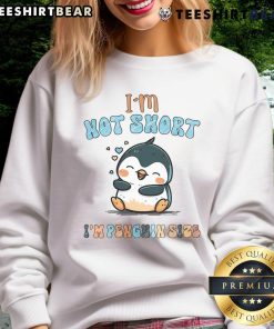 Funny 'I Am Not Short, I Am Penguin Size' sweatshirt design featuring a lazy penguin, perfect for penguin lovers.