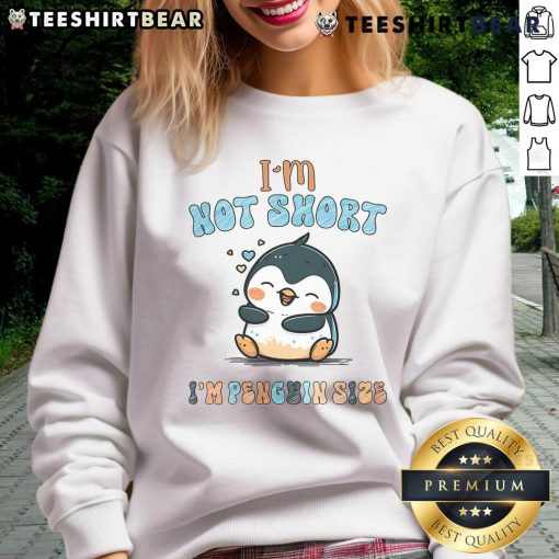 Funny 'I Am Not Short, I Am Penguin Size' sweatshirt design featuring a lazy penguin, perfect for penguin lovers.