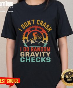 Funny 'I Don't Crash, I Do Random Gravity Checks' mountain biking ladies tee featuring a playful design and vibrant colors.