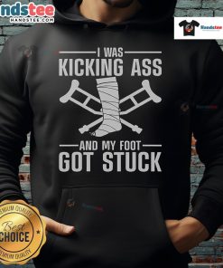 Funny hoodie design featuring 'I Was Kicking Ass and My Foot Got Stuck' for broken leg, ankle, and knee surgery recovery.