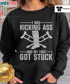 Funny sweatshirt featuring the phrase 'I Was Kicking Ass' with a graphic about broken leg and knee surgery humor.