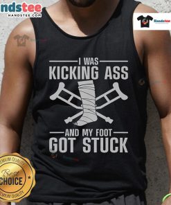 Funny tank top with 'I Was Kicking Ass' slogan, featuring a broken leg graphic, perfect for humor and recovery fashion.