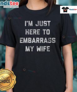 Funny I'm Just Here to Embarrass My Wife/Husband/Dad workout tee for ladies, perfect for lighthearted gym outings.
