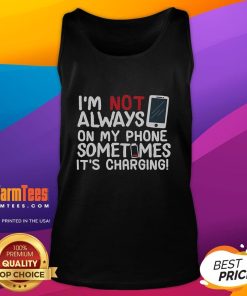 Funny tank top reading 'I'm not always on my phone, sometimes it's charging' perfect for casual wear and humor lovers.