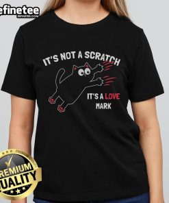 Alt Text: Funny It's Not A Scratch, It's A Love Mark Cat Ladies Tee featuring a playful cat graphic and humorous text design.