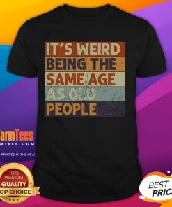 Alt Text: Funny vintage sarcastic T-shirt featuring the quote It's weird being the same age as old people. Perfect for humor lovers.