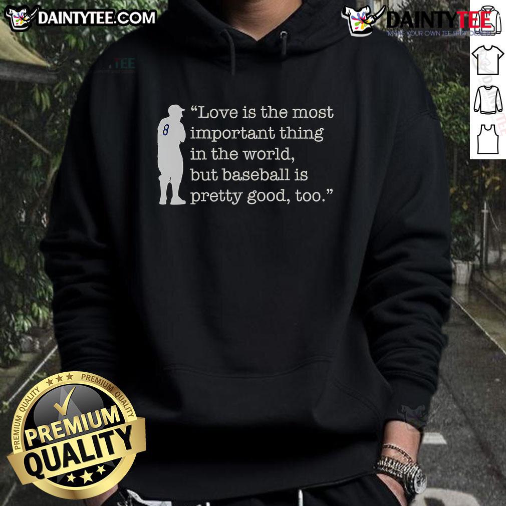 Funny Love Is The Most Important Thing In The World But Baseball Is Pretty Good Too Yogi Berra Hoodie Alt Text: Funny Yogi Berra hoodie featuring 'Love is important, but baseball is pretty good too' quote for sports enthusiasts.