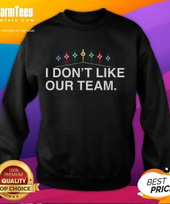 Funny Mike wearing 'I Don't Like Our Team' sweatshirt, showcasing humor and team spirit in casual fashion.
