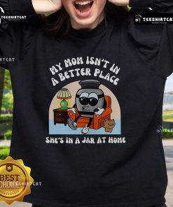 Funny sweatshirt with 'My mom isn't in a better place, she's in a jar at home' design, perfect for humor-loving fans.