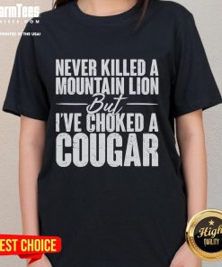 Alt Text: Funny Never Killed A Mountain Lion But I've Choked A Cougar Ladies Tee featuring humorous graphic design.