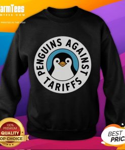 Funny penguins protesting against tariffs in colorful sweatshirts, showcasing humor and creativity in activism.