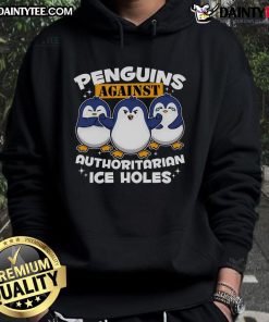 Funny penguins in hoodies protesting against authoritarian ice holes, showcasing playful rebellion and humor.
