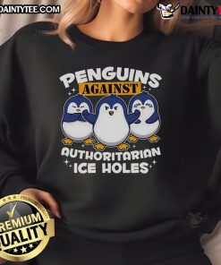 Funny penguins wearing sunglasses on an ice hole sweatshirt, perfect for laughs and style in chilly weather.