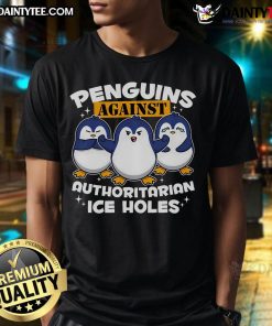 Funny penguins graphic on a T-shirt, mocking authoritarian ice holes, perfect for penguin lovers and humor fans.