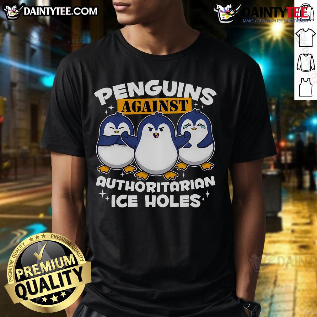Funny Penguins Against Authoritarian Ice Holes Penguin T Shirt Funny penguins graphic on a T-shirt, mocking authoritarian ice holes, perfect for penguin lovers and humor fans.