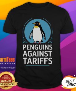 Funny penguins wearing protest signs against tariffs on a humorous T-shirt design, showcasing lively activism.