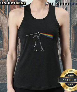 Funny cat wearing a tank top, playfully interacting with light, showcasing adorable antics and playful spirit.