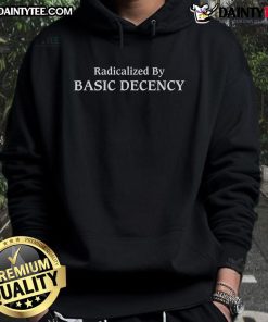 Man wearing a 'Radicalized by Basic Decency' social democracy hoodie, showcasing humor and political activism.