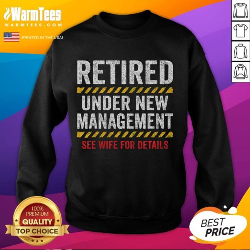 Alt Text: Funny retired husband wearing a retirement sweatshirt at his retirement party, smiling and enjoying the celebration.