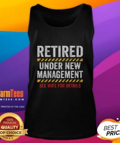 Funny retired husband wearing a humorous retirement tank top at his retirement party, celebrating a new chapter in life.