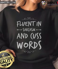 Alt Text: Funny sarcastic saying on 'Fluent in Sarcasm and Cuss Words' sweatshirt, perfect for humor lovers.