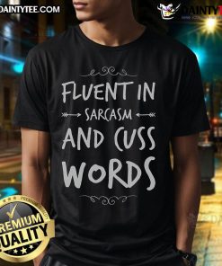 Alt Text: Funny sarcastic saying t-shirt design: 'Fluent in Sarcasm and Cuss Words' in bold, playful typography.