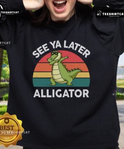 Funny 'See Ya Later Alligator' Florida gator crocodile sweatshirt design featuring a playful alligator illustration.