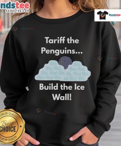 Funny Tariff the Penguins build the ice wall on a cozy sweatshirt, perfect for penguin lovers and unique winter fashion.