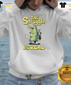 Alt Text: Funny dinosaur toilet hoodie featuring a playful design that humorously captures the struggle is real theme.