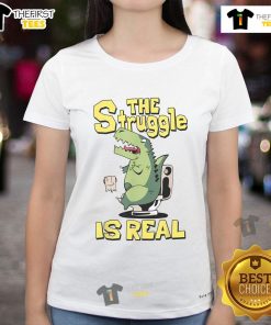 Alt Text: Funny 'The Struggle Is Real' dinosaur toilet ladies tee featuring a humorous graphic design.