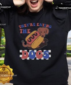Funny Independence Day sweatshirt featuring a humorous design of dogs enjoying a festive celebration.