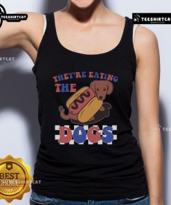 Funny 'Theyre Eating the Dogs' Independence Day tank top featuring a humorous graphic for festive celebrations.