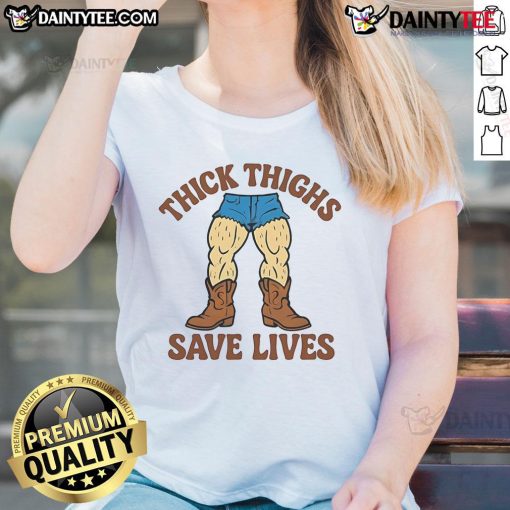 Funny Thick Thighs Save Lives Cowboy Ladies Tee featuring a playful graphic design and stylish fit for casual wear.