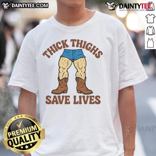 Alt Text: Funny Thick Thighs Save Lives Cowboy T-Shirt featuring a humorous graphic design and vibrant colors for casual wear.